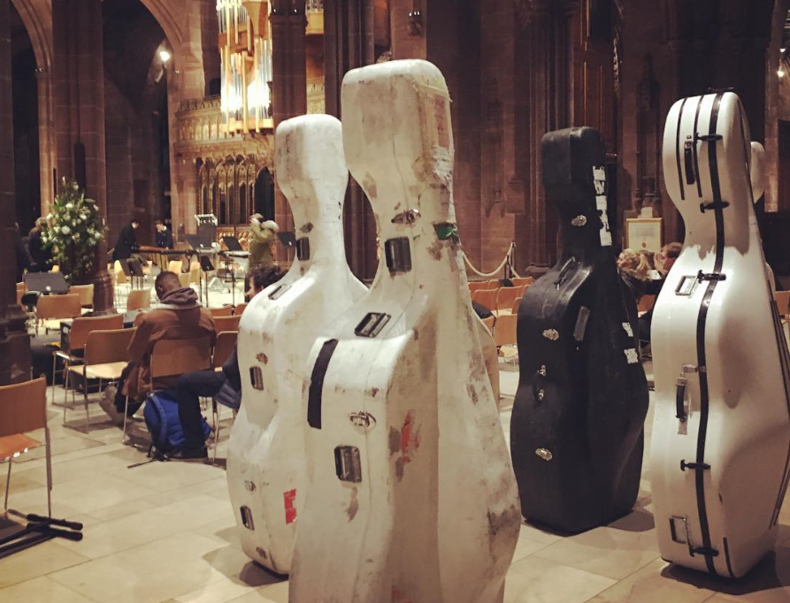 Cellos in a dining hall before a performance