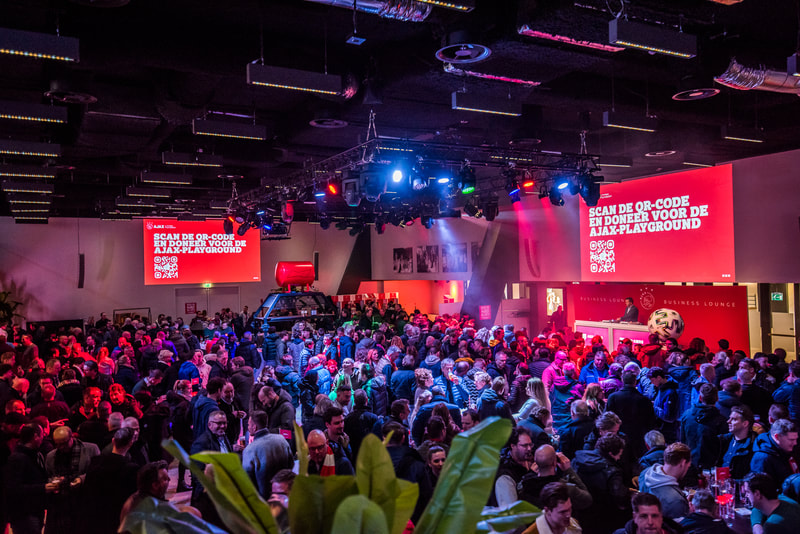 Fan zone with supporters during a large-scale Ajax event
