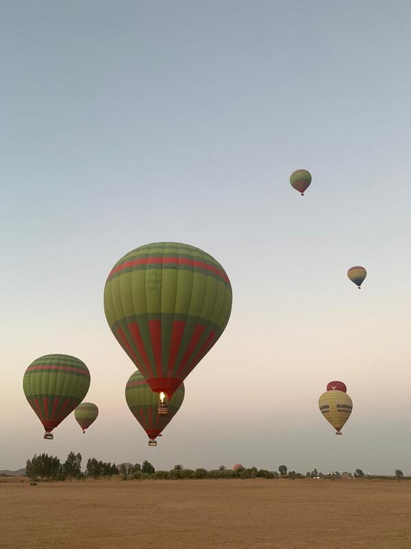 Hot-air balloons over the field during an incentive trip