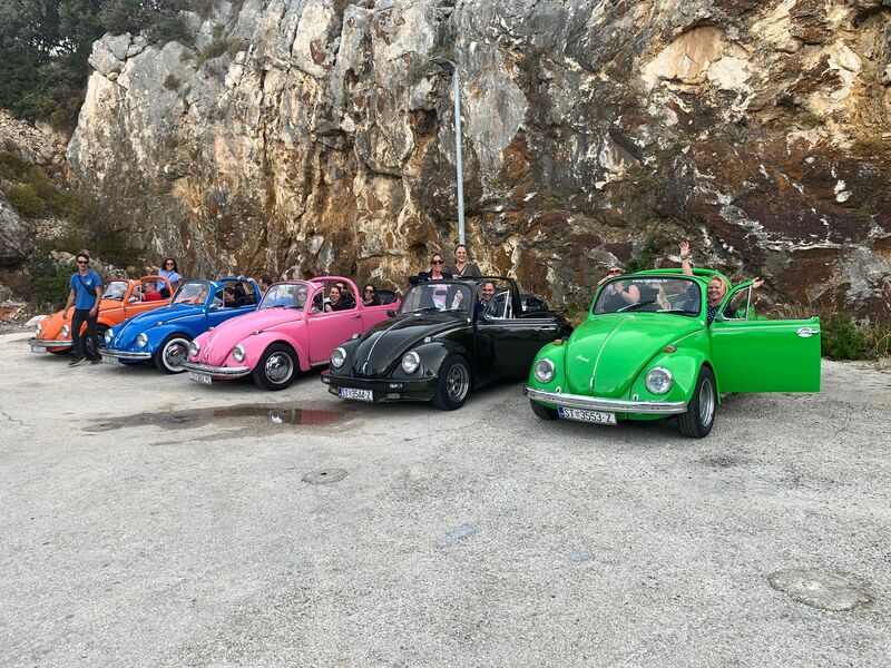 Classic cars in a parking area during an incentive