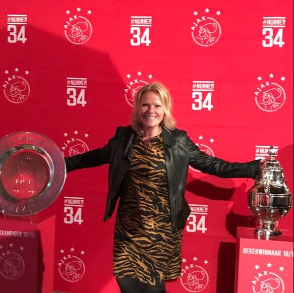 Susan Casemier with the Ajax league shield and cup, 2018/2019 season